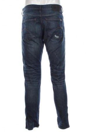 Męskie jeansy G-Star Raw, Rozmiar M, Kolor Niebieski, Cena 138,99 zł