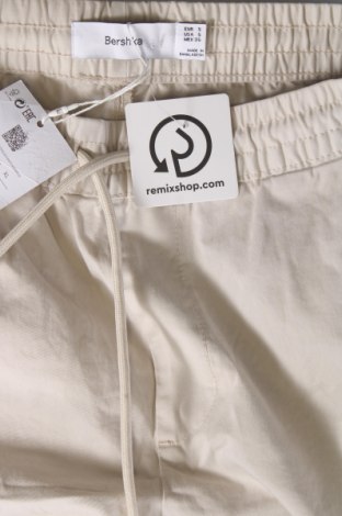 Męskie spodnie Bershka, Rozmiar S, Kolor Beżowy, Cena 82,90 zł