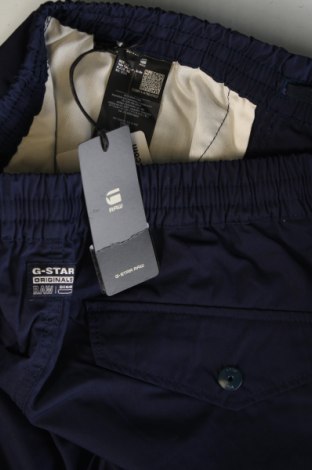 Pánské kalhoty  G-Star Raw, Velikost XS, Barva Modrá, Cena  1 379,00 Kč