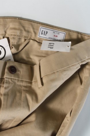 Pantaloni de bărbați Gap, Mărime M, Culoare Bej, Preț 101,99 Lei