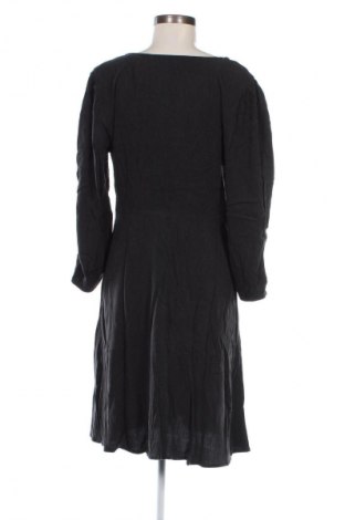 Kleid Guido Maria Kretschmer for About You, Größe M, Farbe Schwarz, Preis 28,49 €