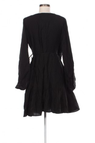 Kleid Guido Maria Kretschmer for About You, Größe L, Farbe Schwarz, Preis € 28,49