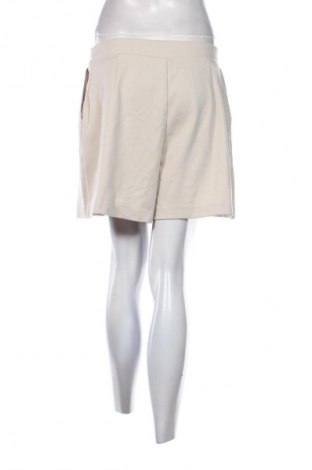 Damskie szorty H&M, Rozmiar M, Kolor Beżowy, Cena 43,68 zł