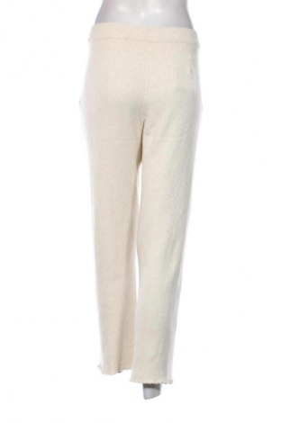 Pantaloni de femei Uniqlo, Mărime L, Culoare Ecru, Preț 289,47 Lei