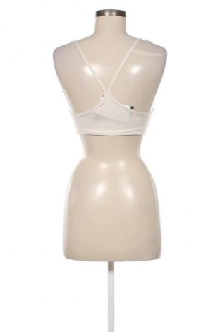 Női sport top Nike, Méret S, Szín Ekrü
, Ár 16 709 Ft