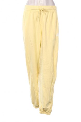 Damskie spodnie sportowe Adidas, Rozmiar S, Kolor Żółty, Cena 305,99 zł