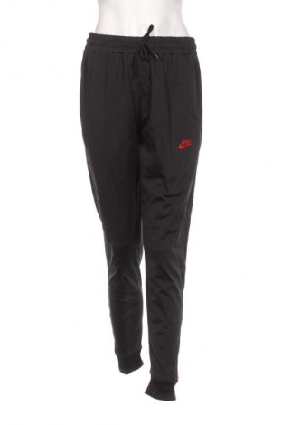 Γυναικείο αθλητικό παντελόνι Nike, Μέγεθος L, Χρώμα Μαύρο, Τιμή 26,99 €