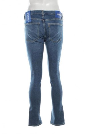 Męskie jeansy Hugo Boss, Rozmiar M, Kolor Niebieski, Cena 624,99 zł