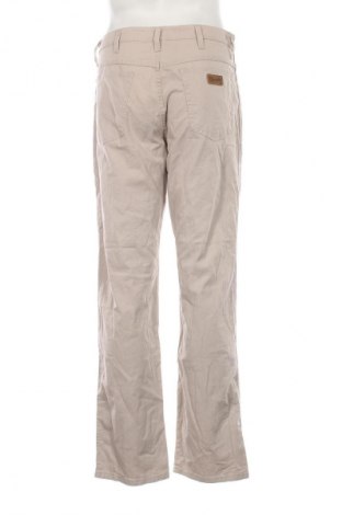 Herren Jeans Wrangler, Größe L, Farbe Beige, Preis 38,27 €