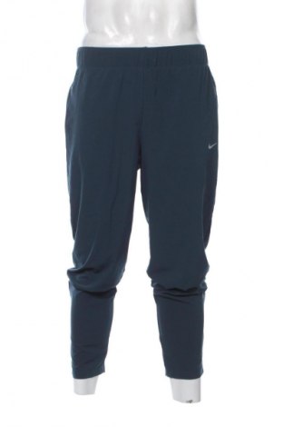 Pánské tepláky  Nike, Velikost S, Barva Modrá, Cena  1 749,00 Kč