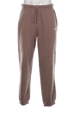 Męskie spodnie sportowe Nike, Rozmiar S, Kolor Popielaty róż, Cena 157,99 zł