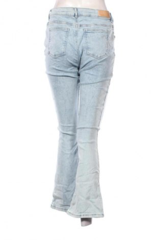 Damskie jeansy Flare, Rozmiar L, Kolor Niebieski, Cena 95,99 zł
