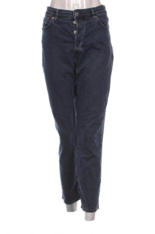 Damskie jeansy H&M, Rozmiar L, Kolor Niebieski, Cena 95,99 zł
