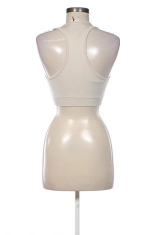 Damski sportowy top Unbranded, Rozmiar L, Kolor Beżowy, Cena 55,21 zł