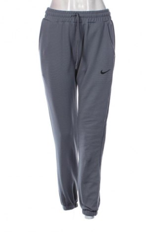 Pantaloni trening de femei Nike, Mărime M, Culoare Gri, Preț 107,89 Lei