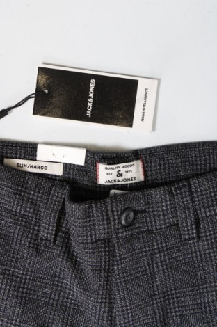 Pánske nohavice  Jack & Jones, Veľkosť S, Farba Sivá, Cena  42,27 €