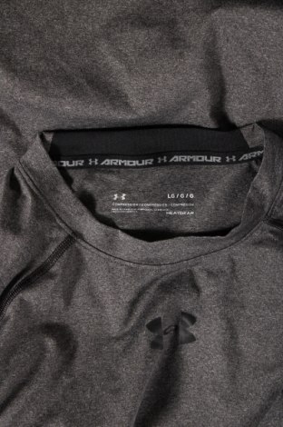 Γυναικείο t-shirt Under Armour, Μέγεθος L, Χρώμα Γκρί, Τιμή 12,99 €