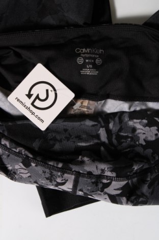 Damskie legginsy Calvin Klein, Rozmiar L, Kolor Kolorowy, Cena 138,99 zł