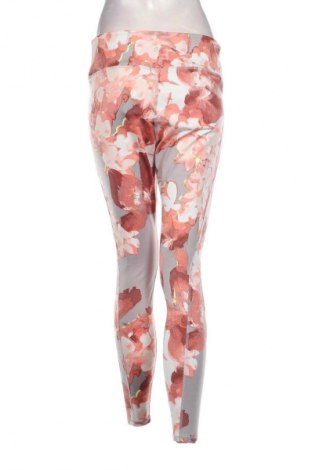 Damskie legginsy H&M Sport, Rozmiar L, Kolor Kolorowy, Cena 26,99 zł