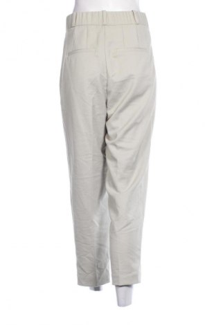 Pantaloni de femei H&M, Mărime M, Culoare Bej, Preț 45,99 Lei