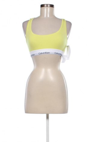 Top sport de damă. Calvin Klein, Mărime M, Culoare Galben, Preț 196,00 Lei