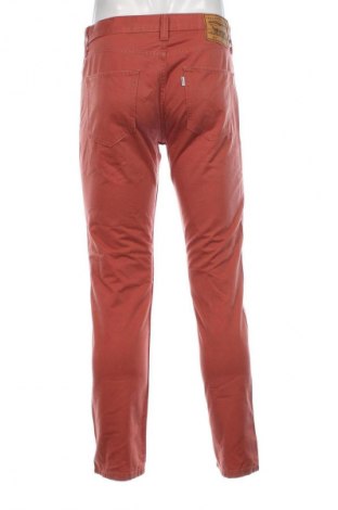 Herren Jeans Levi's, Größe M, Farbe Orange, Preis € 18,99