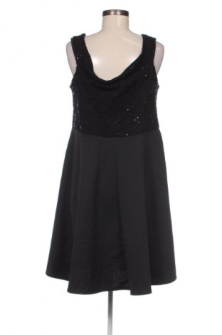 Kleid Quiz, Größe M, Farbe Schwarz, Preis 53,99 €