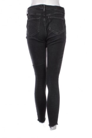 Damskie jeansy River Island, Rozmiar M, Kolor Czarny, Cena 94,48 zł