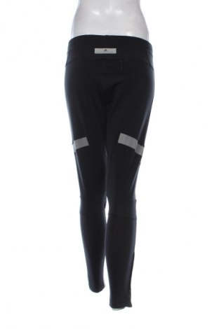 Damskie legginsy Adidas, Rozmiar L, Kolor Czarny, Cena 78,09 zł