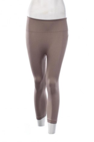 Damskie legginsy Work Out, Rozmiar M, Kolor Beżowy, Cena 58,43 zł