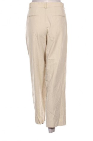 Dámske nohavice Uniqlo, Veľkosť M, Farba Kremová, Cena  23,95 €