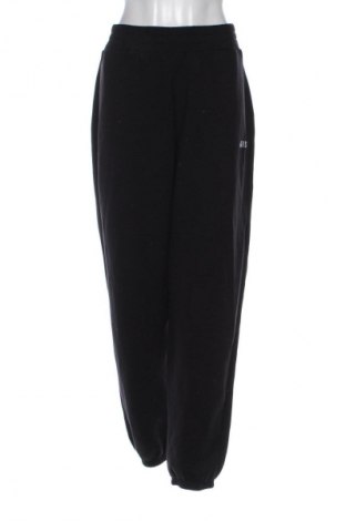 Damen Sporthose Guess, Größe L, Farbe Schwarz, Preis 29,16 €