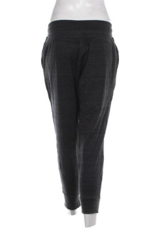 Damskie spodnie sportowe Nike, Rozmiar M, Kolor Czarny, Cena 134,99 zł