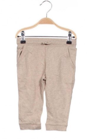 Детско спортно долнище H&M, Размер 9-12m/ 74-80 см, Цвят Бежов, Цена 16,99 лв.