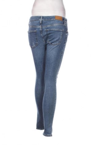 Damskie jeansy River Island, Rozmiar M, Kolor Niebieski, Cena 46,99 zł