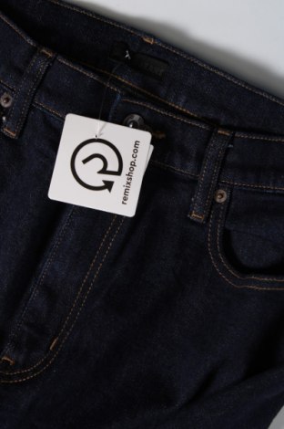 Damskie jeansy Uniqlo, Rozmiar L, Kolor Niebieski, Cena 103,45 zł