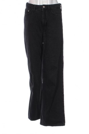 Damskie jeansy H&M, Rozmiar S, Kolor Czarny, Cena 66,65 zł