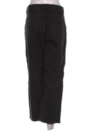 Dámske džínsy  Uniqlo, Veľkosť M, Farba Čierna, Cena  54,95 €