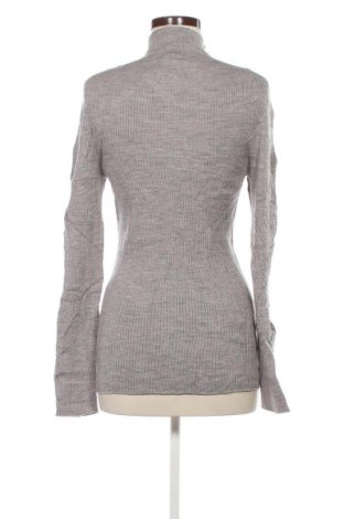 Дамски пуловер Uniqlo, Размер L, Цвят Бежов, Цена 27,99 лв.