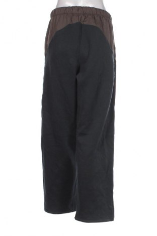 Damskie spodnie sportowe Converse, Rozmiar M, Kolor Kolorowy, Cena 134,99 zł
