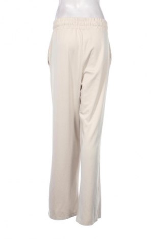 Női sport nadrág H&M Sport, Méret L, Szín Bézs, Ár 5 865 Ft