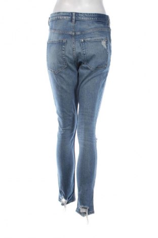 Damskie jeansy H&M, Rozmiar L, Kolor Niebieski, Cena 40,99 zł