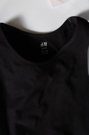 Dámský sportovní top  H&M Divided, Velikost M, Barva Černá, Cena  119,00 Kč