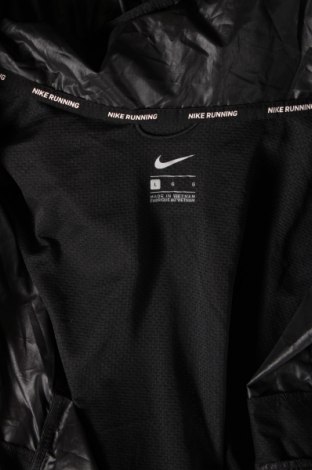 Γυναικείο μπουφάν Nike, Μέγεθος L, Χρώμα Μαύρο, Τιμή 50,99 €