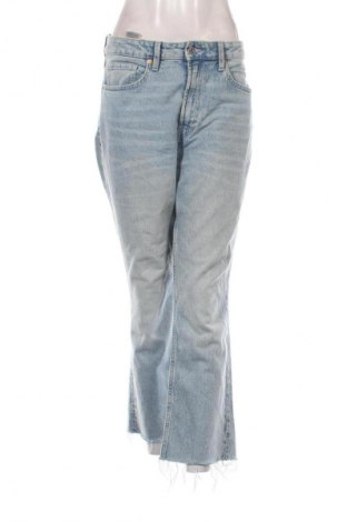 Damskie jeansy H&M, Rozmiar L, Kolor Niebieski, Cena 66,67 zł