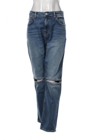 Damskie jeansy Zara, Rozmiar L, Kolor Niebieski, Cena 62,07 zł