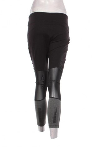 Damskie legginsy Crivit, Rozmiar XL, Kolor Czarny, Cena 59,40 zł