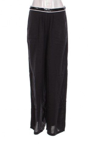 Damskie spodnie Calzedonia, Rozmiar M, Kolor Niebieski, Cena 94,25 zł