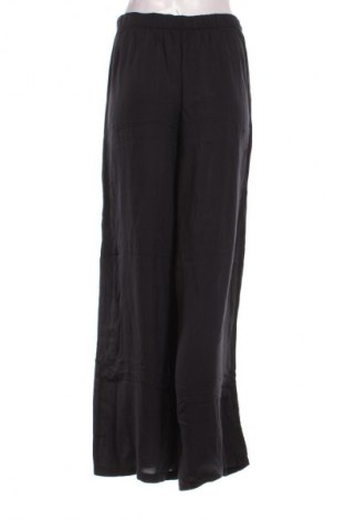 Damskie spodnie Calzedonia, Rozmiar M, Kolor Niebieski, Cena 94,25 zł