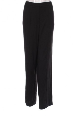 Damskie spodnie H&M, Rozmiar L, Kolor Kolorowy, Cena 67,41 zł